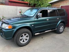 Тюнинг внедорожника Порог труба с проступью Mitsubishi Pajero Sport 1998-2007