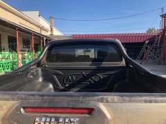 Тюнинг внедорожника Защитные дуги кузова Toyota Hilux Black Onyx 2020