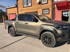 Тюнинг внедорожника Защитные дуги кузова Toyota Hilux Black Onyx 2020