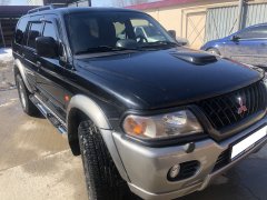 Тюнинг внедорожника Порог труба с проступью Mitsubishi Pajero Sport 1998-2007