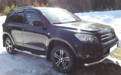 Тюнинг внедорожника Порог труба с проступью Toyota RAV4 2006-2009