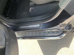 Тюнинг внедорожника Пороги с накладным листом Chery Exeed VX 2022