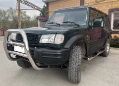 Тюнинг внедорожника Порог труба с проступью Hyundai Galloper 1995
