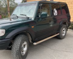 Тюнинг внедорожника Защита штатного порога труба Mitsubishi Pajero 1 1986-2006