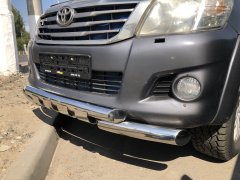 Тюнинг внедорожника Защита переднего бампера Toyota Hilux 2011