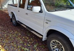 Тюнинг внедорожника Порог труба с проступью Mazda BT-50 2006