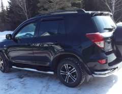 Тюнинг внедорожника Порог труба с проступью Toyota RAV4 2010-2012