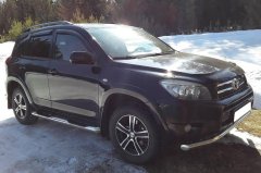 Тюнинг внедорожника Порог труба с проступью Toyota RAV4 2010-2012