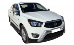 Тюнинг внедорожника Пороги с накладным листом Ssang Yong Actyon Sports 2012