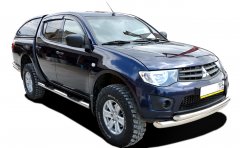 Тюнинг внедорожника Порог труба с проступью Mitsubishi L200 2006