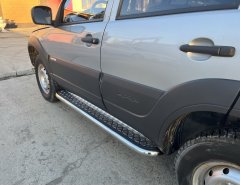 Тюнинг внедорожника Пороги с накладным листом Chevrolet Niva 2010