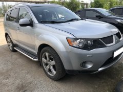 Тюнинг внедорожника Пороги с накладным листом Mitsubishi Outlander XL 2006-2009